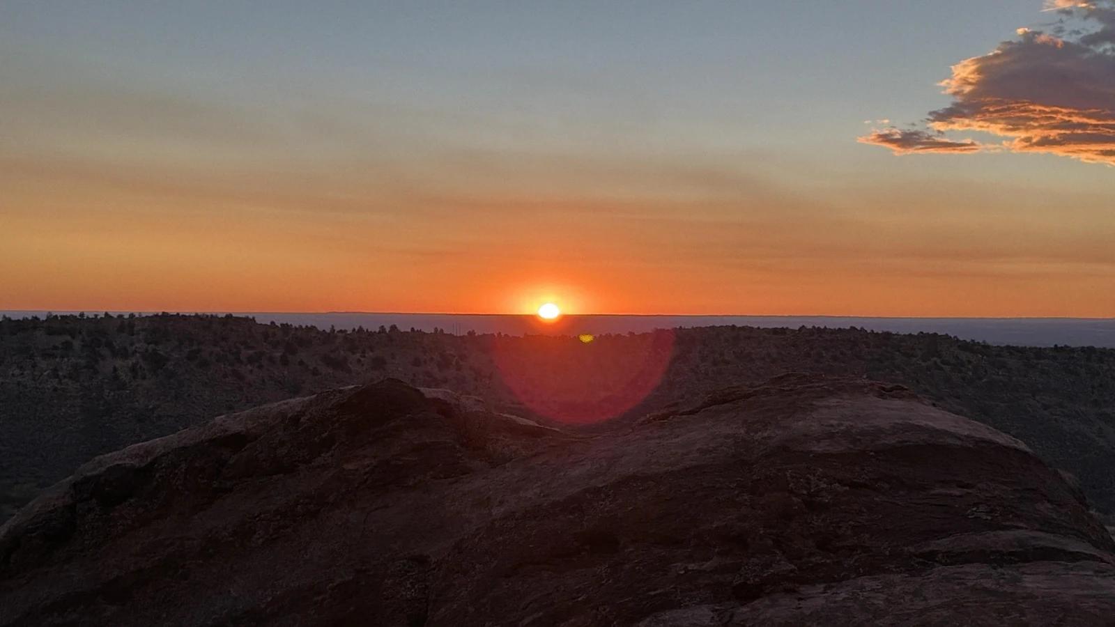 Golden Colorado sunset over a rocky landscape